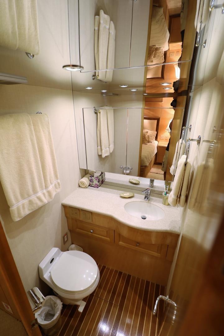 a bathroom with a toilet and sink aboard No Name Yacht for Sale