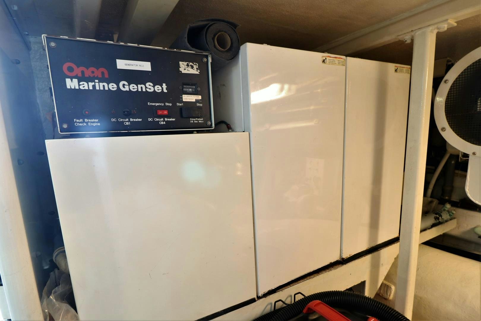 a large white machine aboard No Name Yacht for Sale