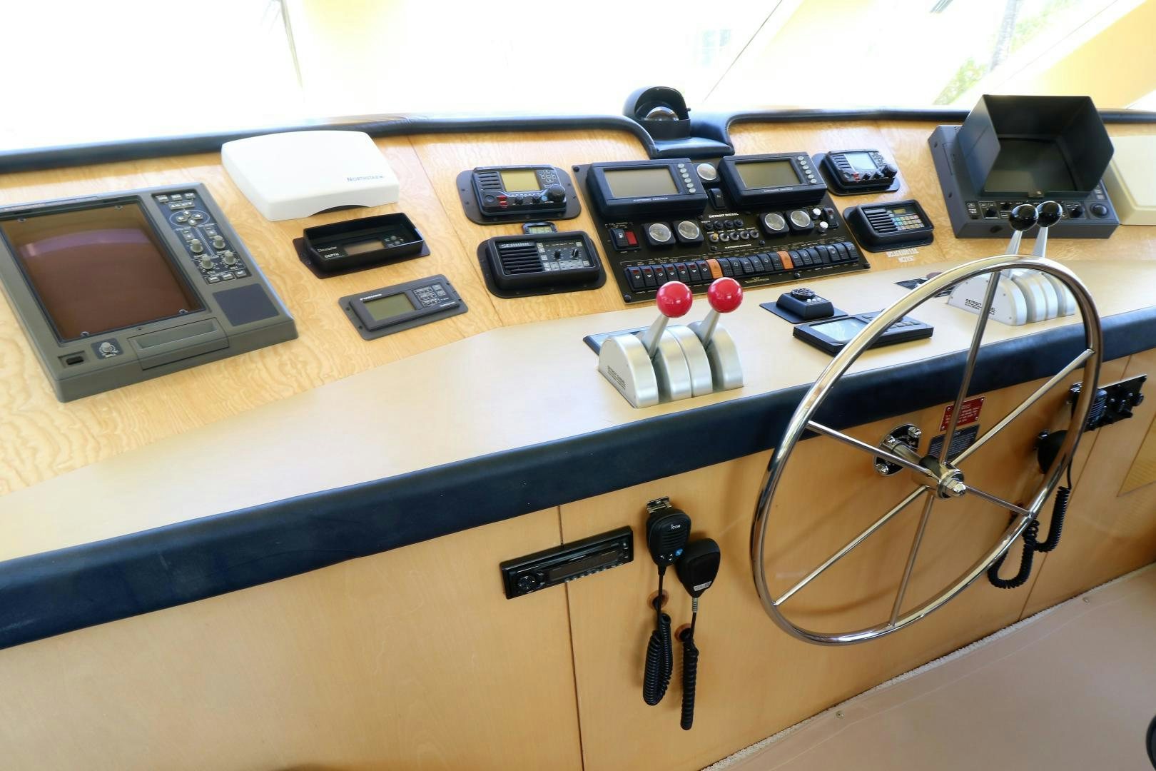 a table with a variety of electronics on it aboard No Name Yacht for Sale