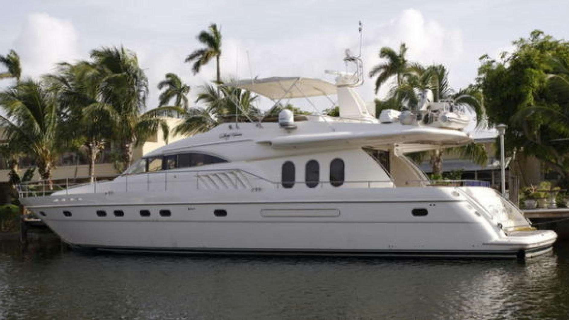 a white yacht on the water aboard LADY KARIMAN Yacht for Sale