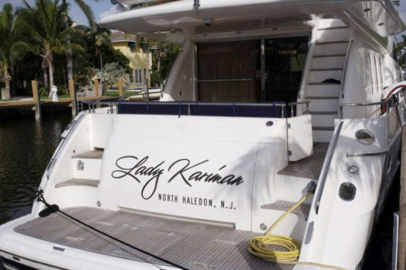 a boat with a sign on the front aboard LADY KARIMAN Yacht for Sale