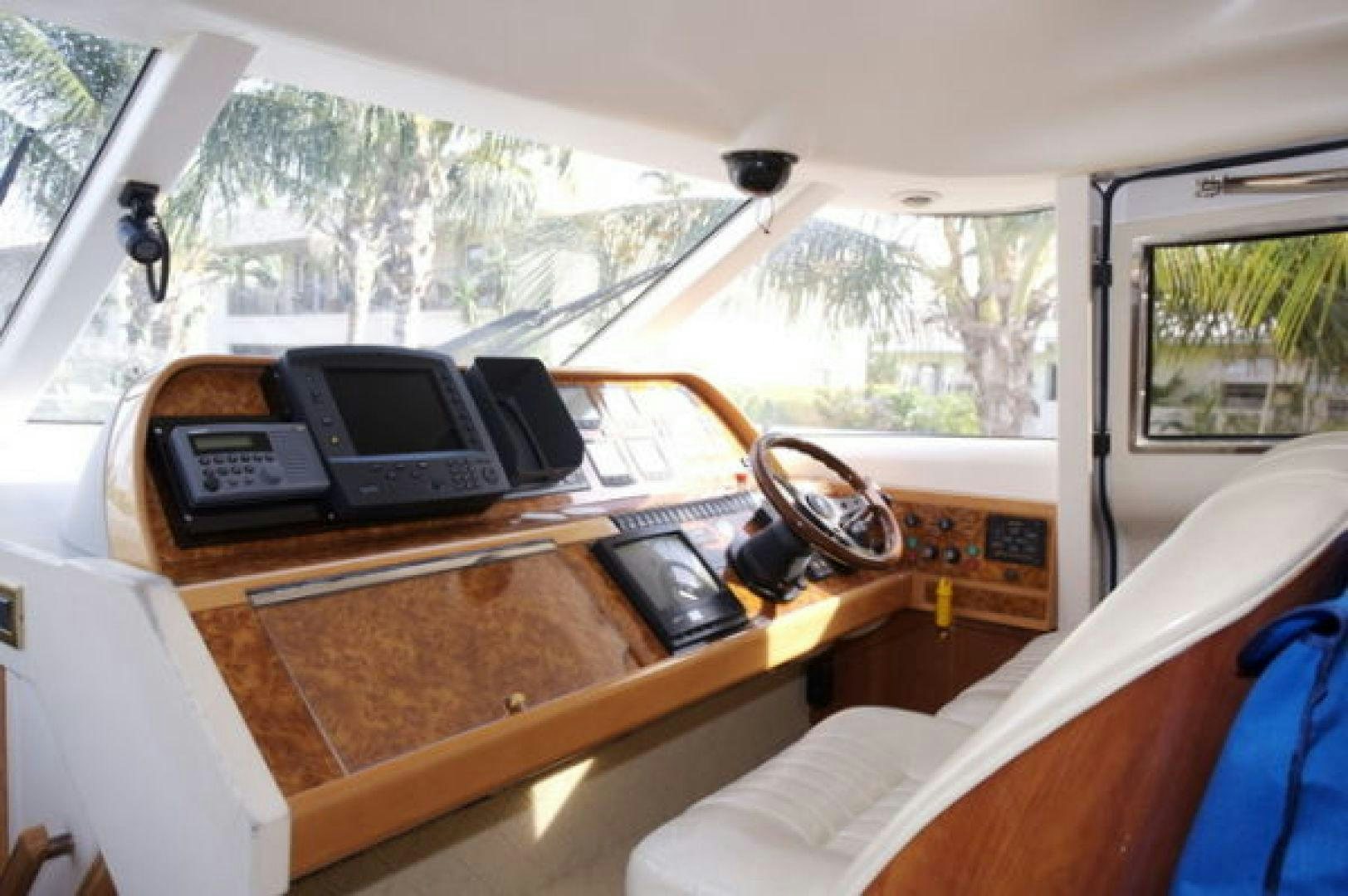 a car with a phone and a phone on the dashboard aboard LADY KARIMAN Yacht for Sale