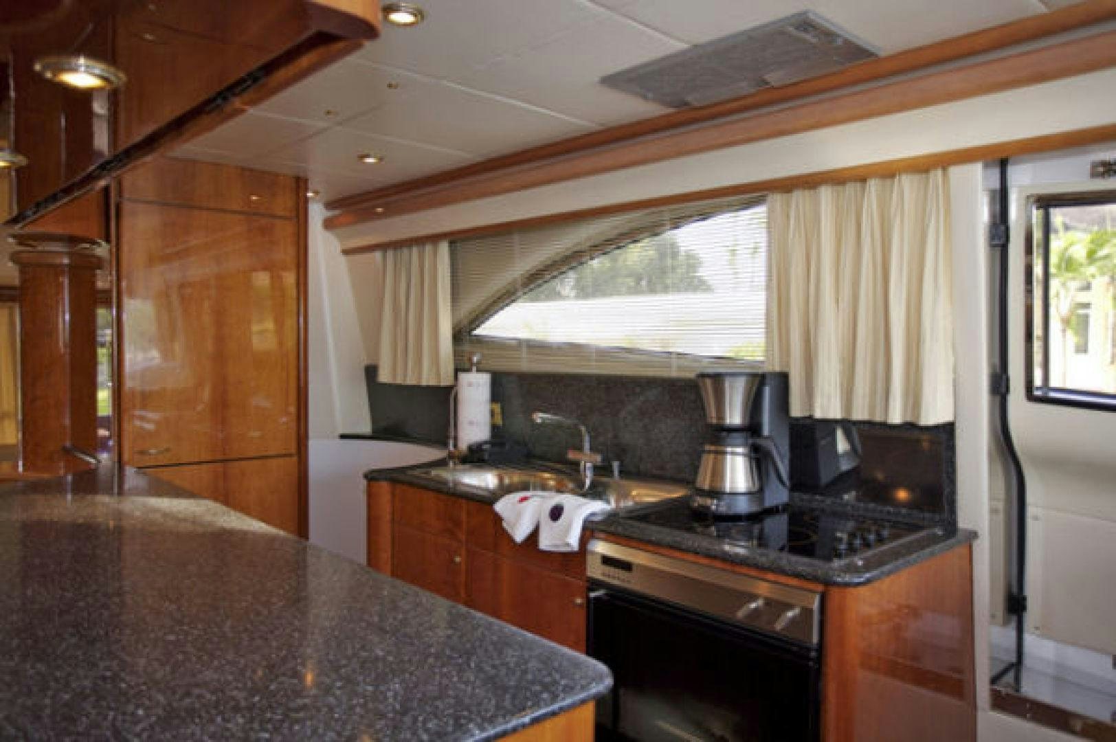 a kitchen with a large countertop aboard LADY KARIMAN Yacht for Sale