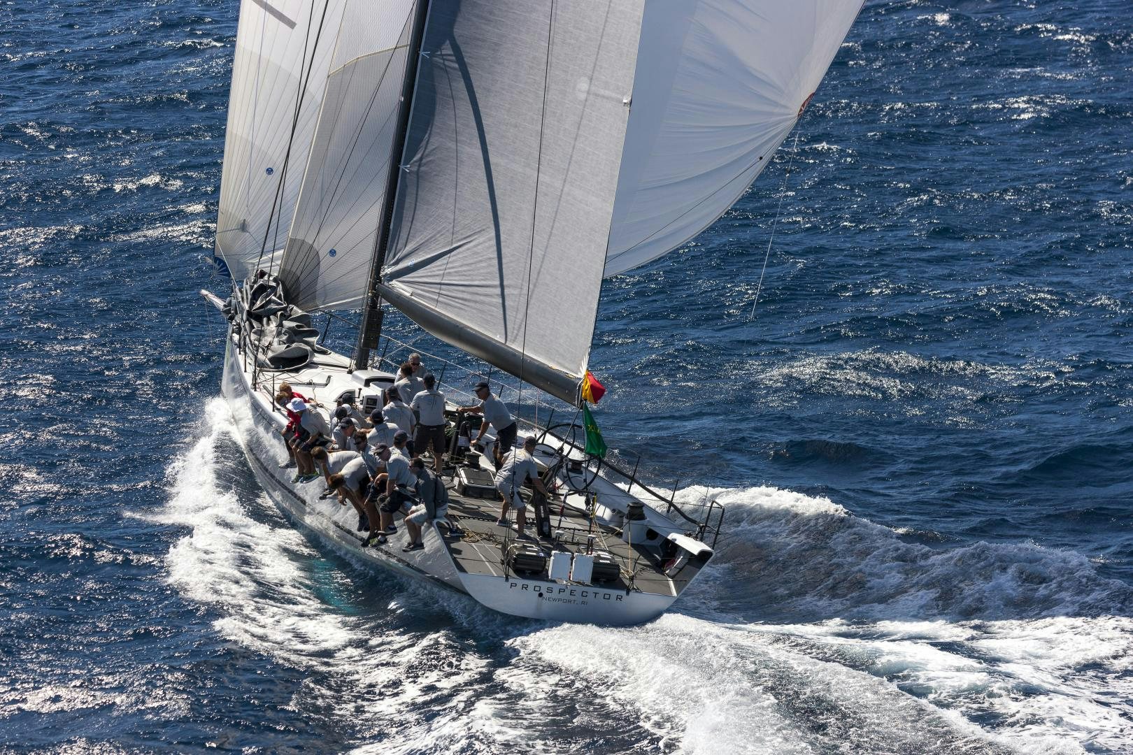 a group of people on a sailboat in the water aboard PROSPECTOR Yacht for Sale