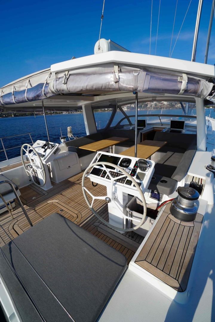 a boat on a deck aboard horizon Yacht for Sale