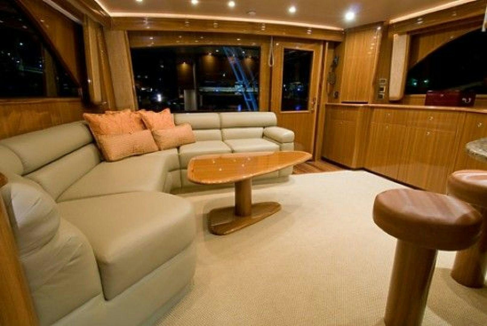 a living room with a couch and a table aboard NO NAME 68 Yacht for Sale