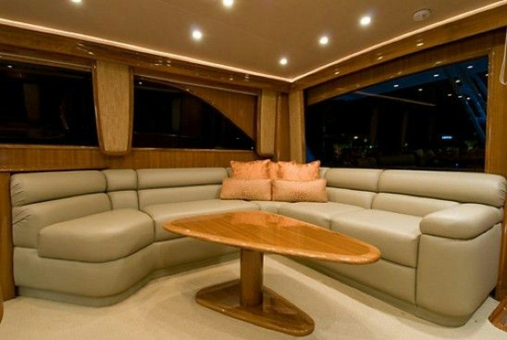 a living room with a couch and a coffee table aboard NO NAME 68 Yacht for Sale