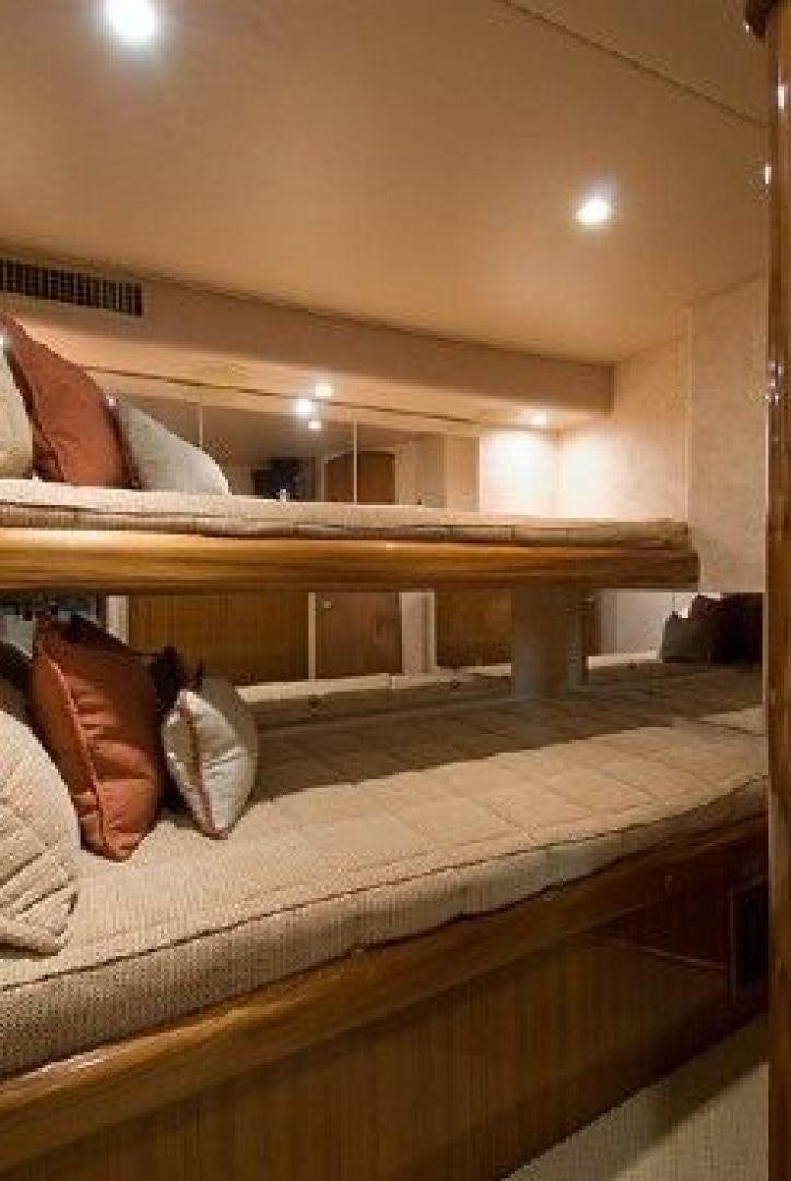 a bed with a bench aboard NO NAME 68 Yacht for Sale