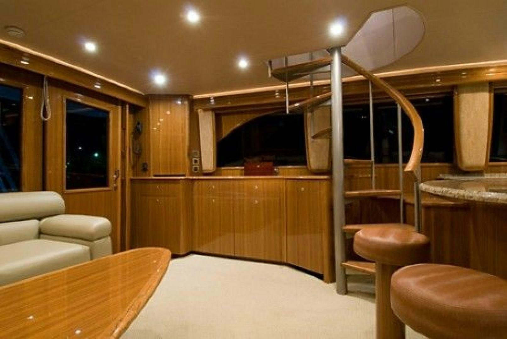 a room with a bed and a table and chairs aboard NO NAME 68 Yacht for Sale