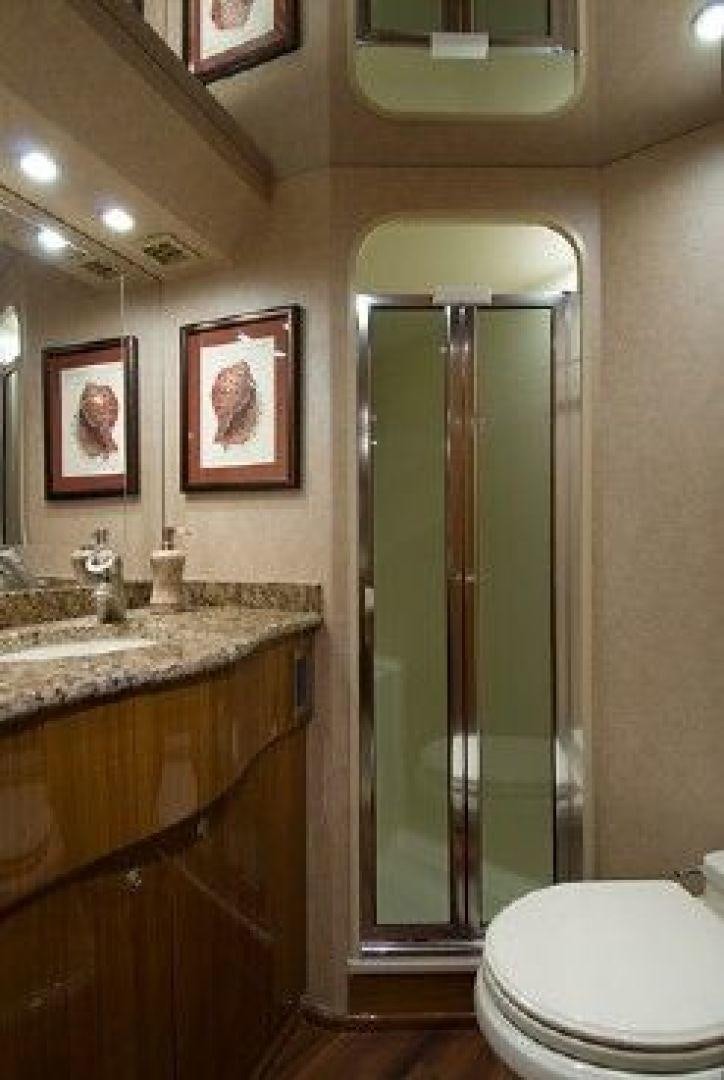 a bathroom with a glass shower aboard NO NAME 68 Yacht for Sale