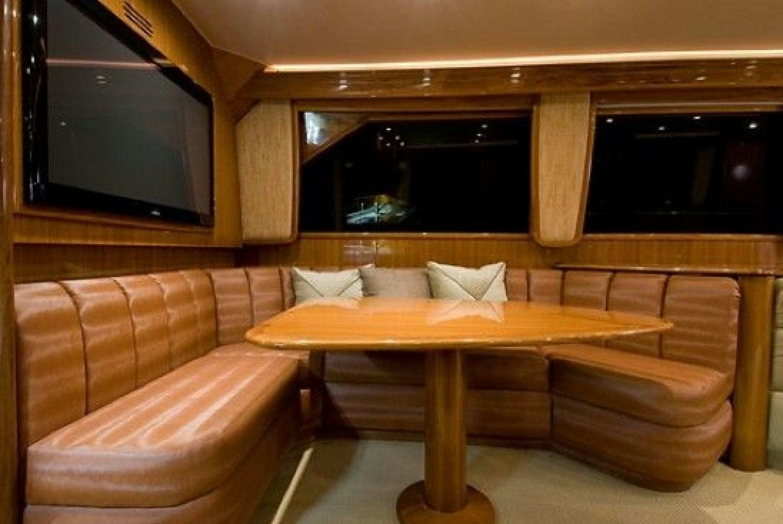 a living room with a couch and a table aboard NO NAME 68 Yacht for Sale