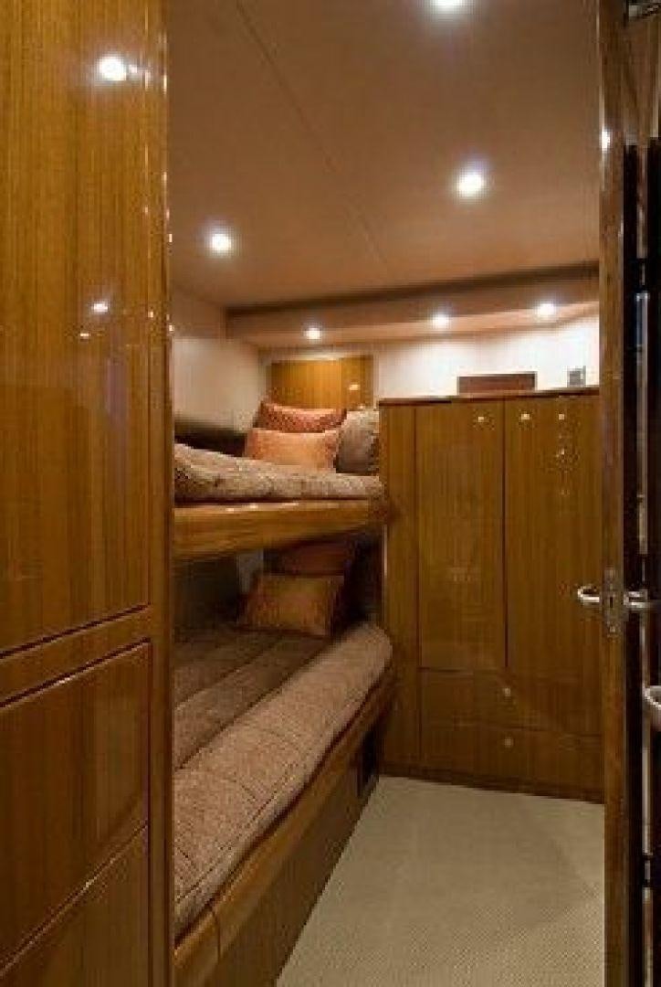 a room with a bed and a closet aboard NO NAME 68 Yacht for Sale