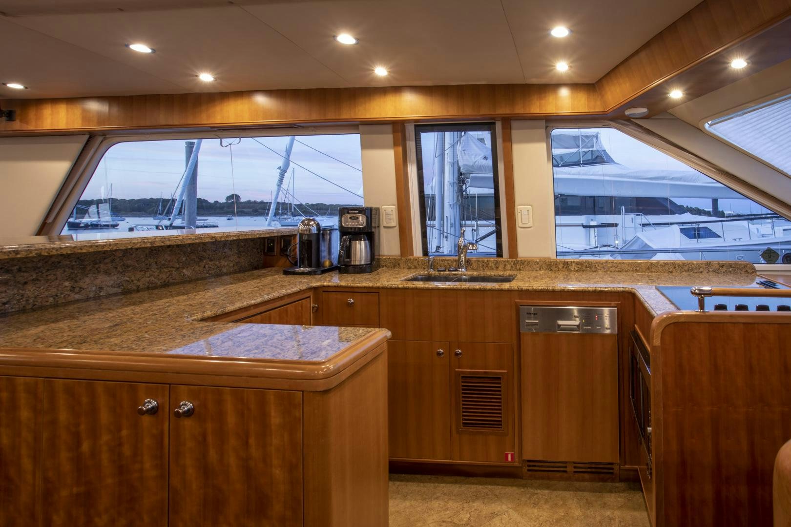 a kitchen with a sink and cabinets aboard DIAMANTE  Yacht for Sale