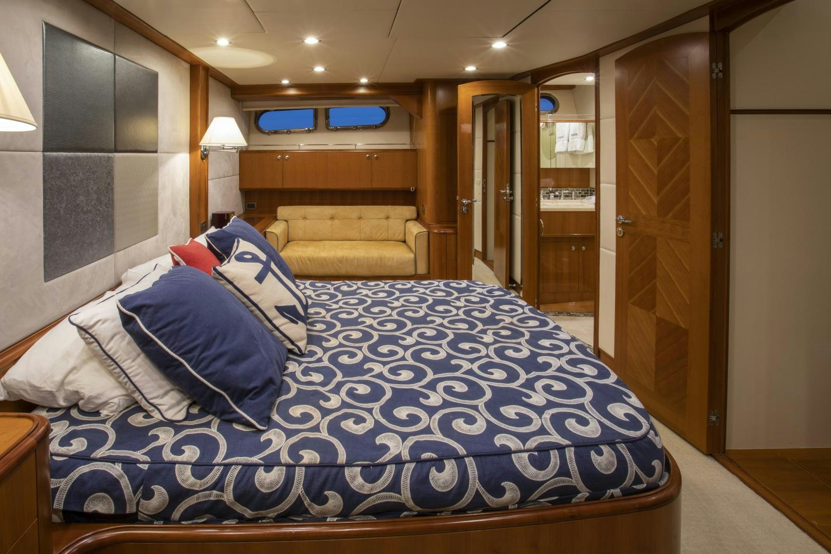 a bed in a room aboard DIAMANTE  Yacht for Sale
