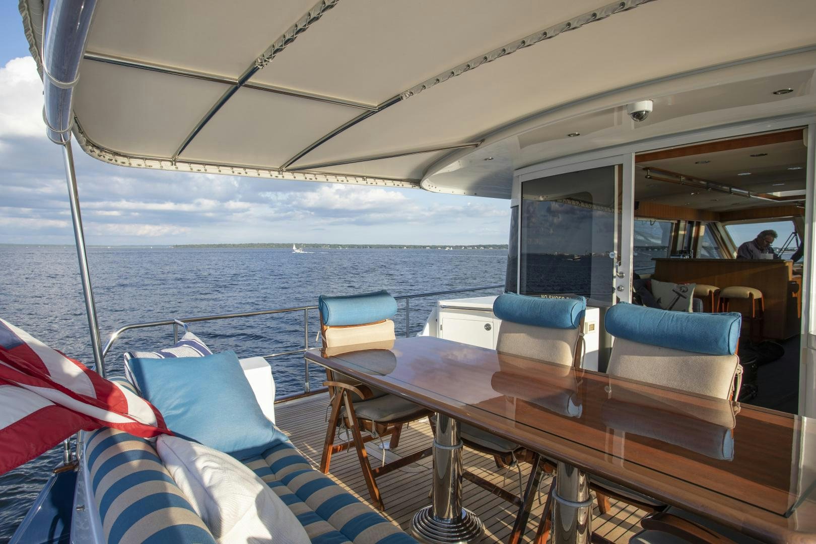 a boat with a table and chairs on it aboard DIAMANTE  Yacht for Sale