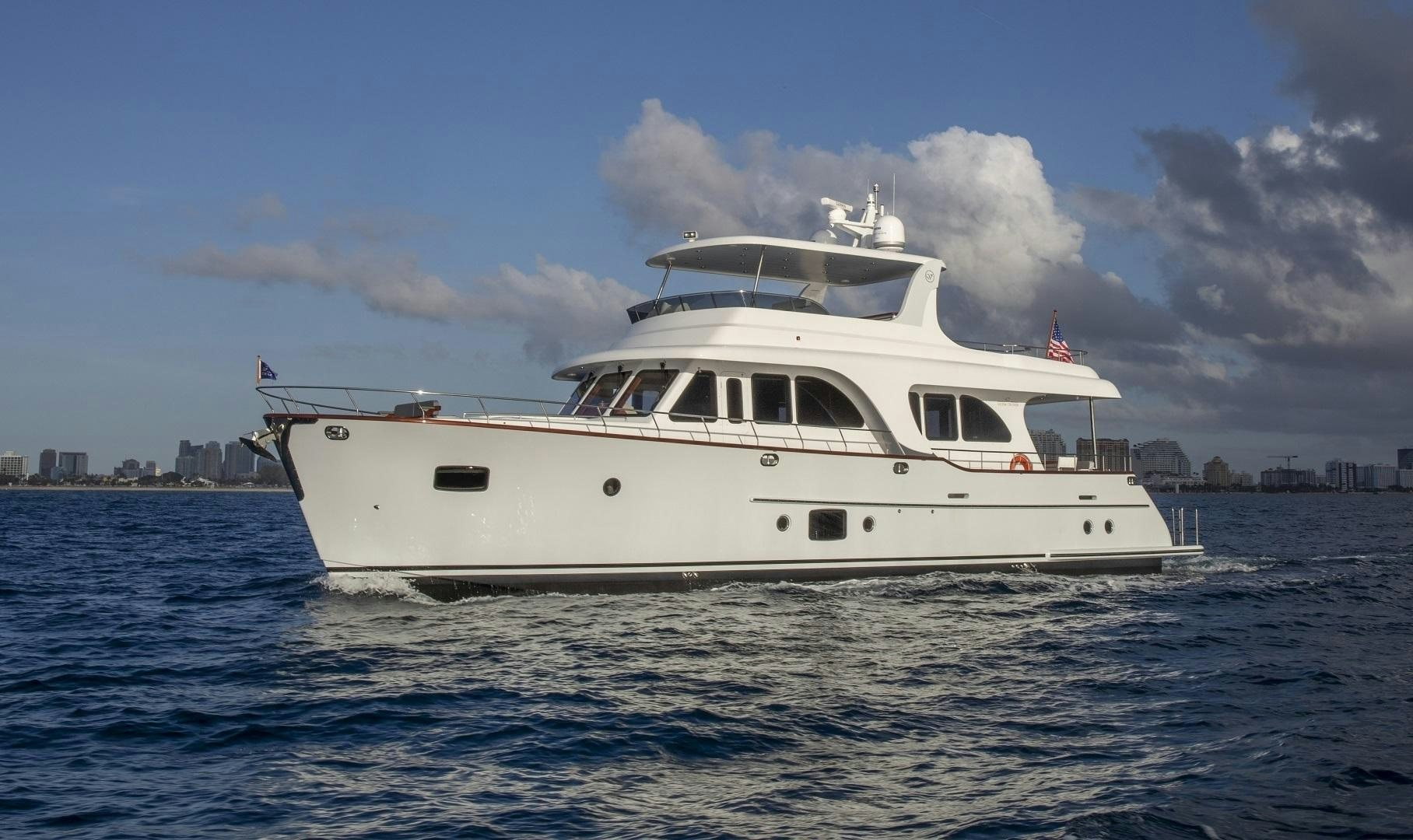 a white yacht in the water aboard 67 CRUISER Yacht for Sale
