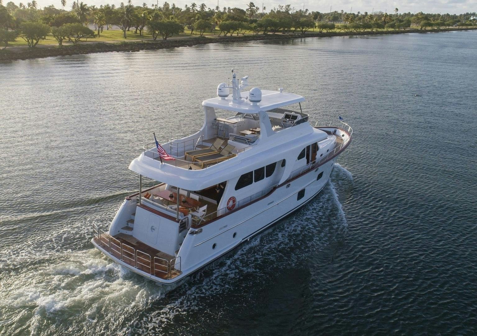 a boat on the water aboard 67 CRUISER Yacht for Sale