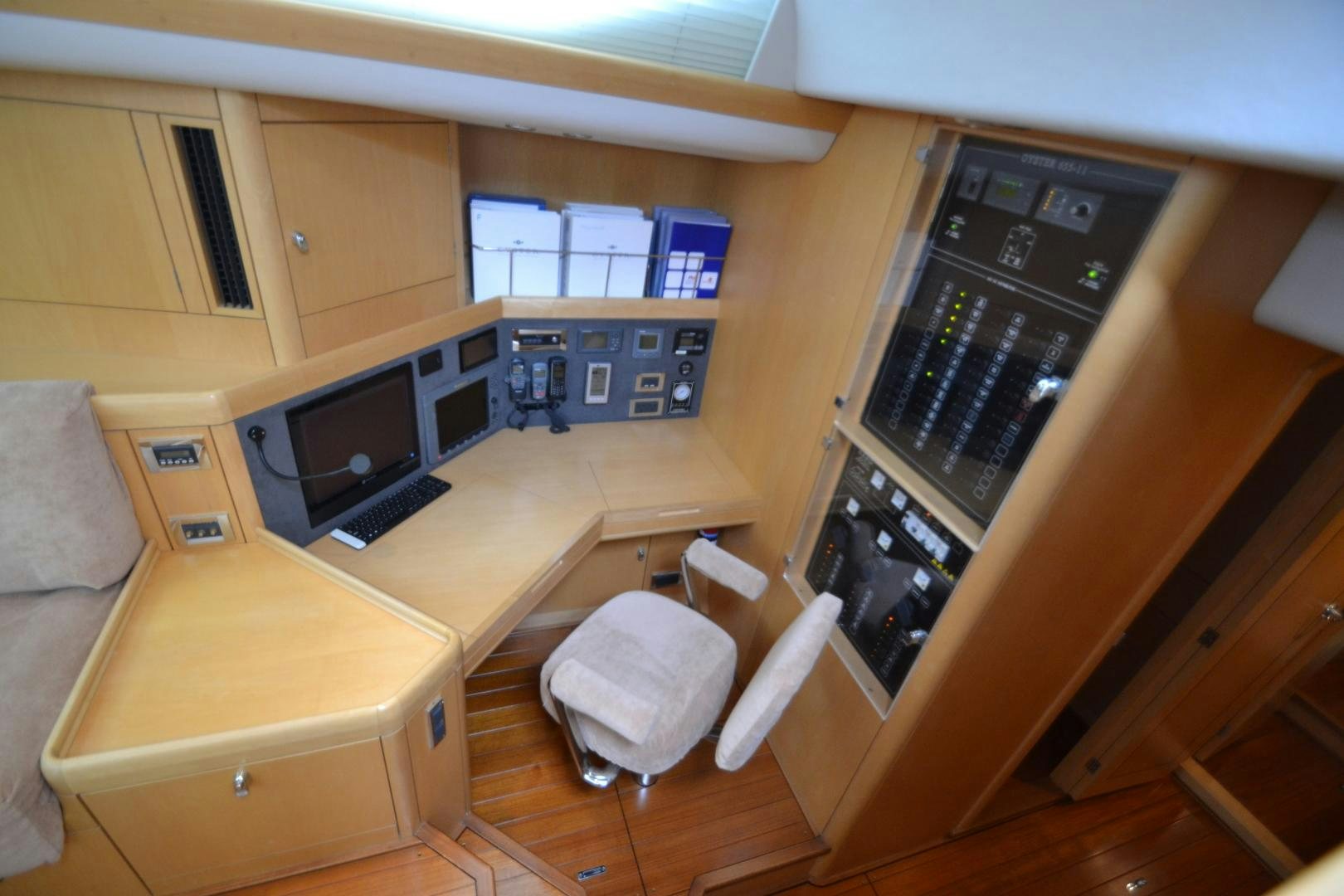 a room with a bed and a microwave oven aboard isnl Yacht for Sale