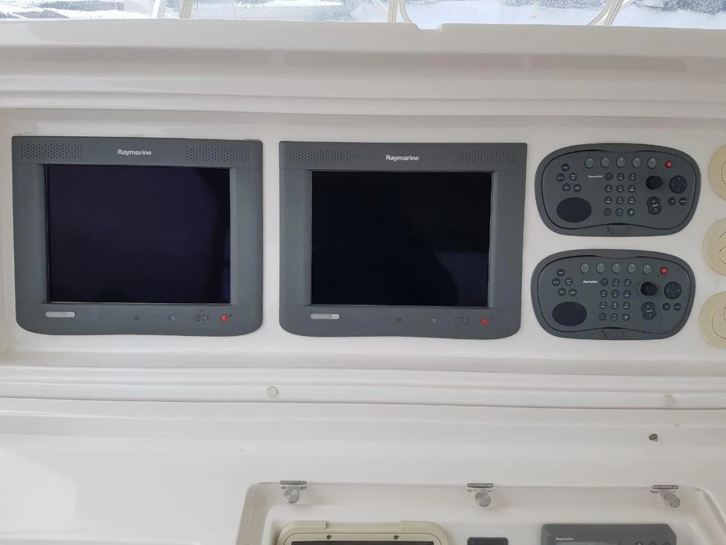 a white computer with a screen aboard BOUKI Yacht for Sale