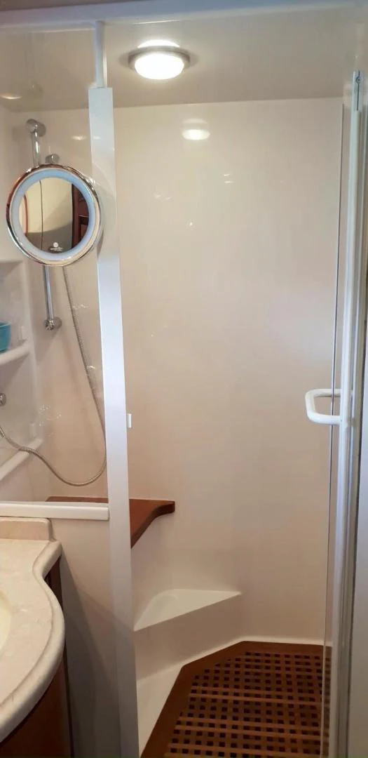 a bathroom with a sink and a mirror aboard BOUKI Yacht for Sale
