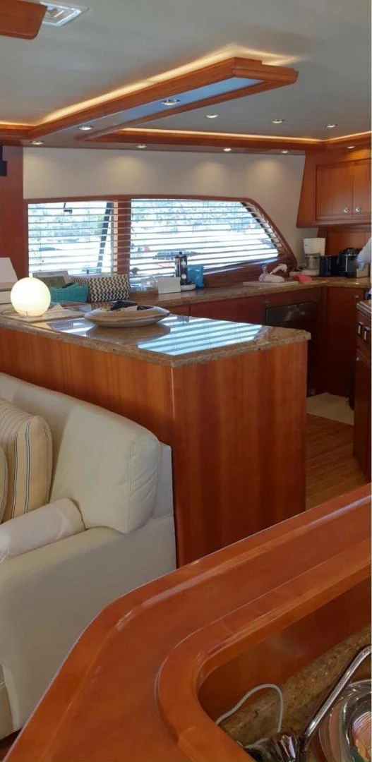 a kitchen with a counter and a window aboard BOUKI Yacht for Sale