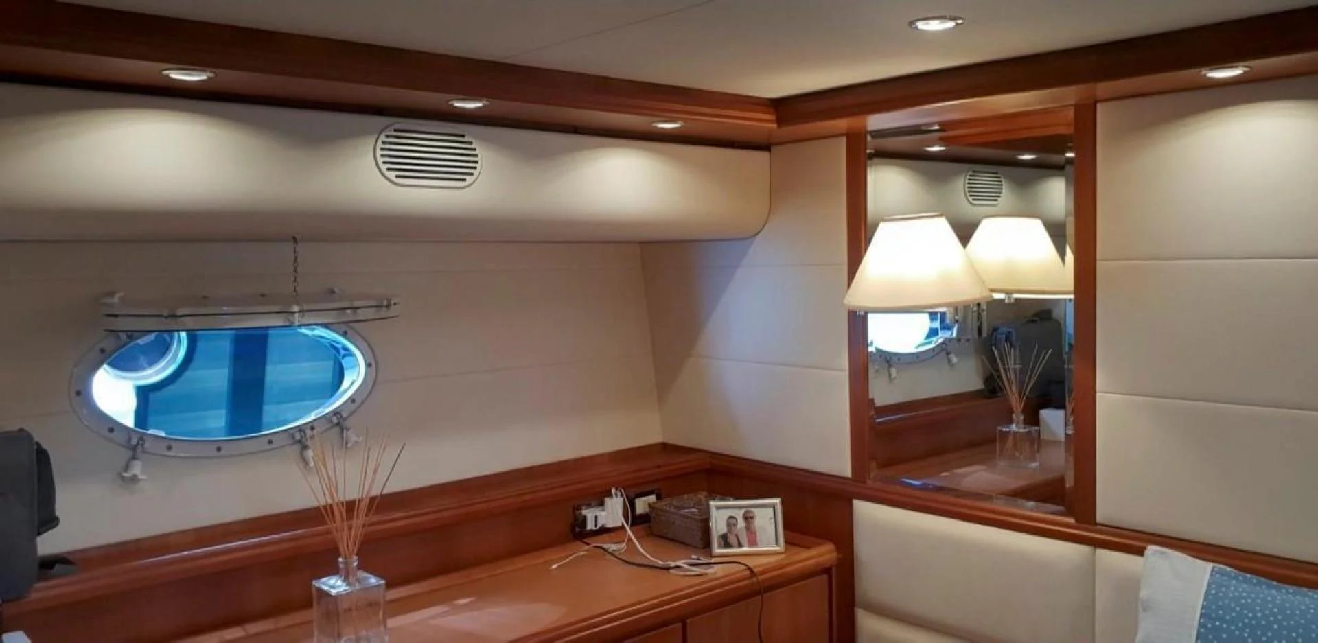 a room with a desk and a mirror aboard BOUKI Yacht for Sale