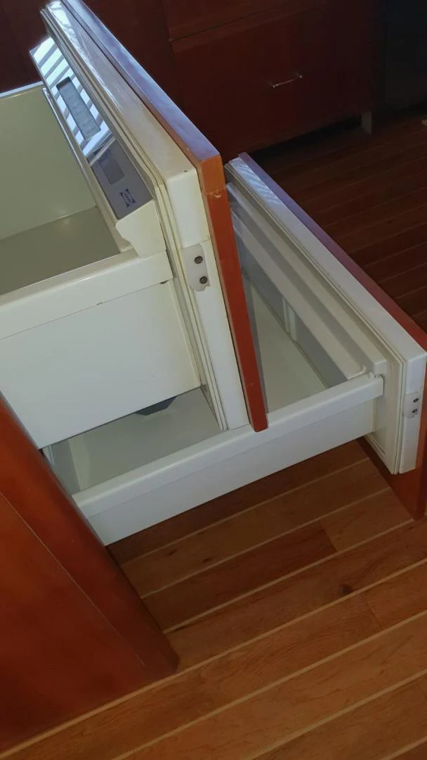 a cabinet with drawers aboard BOUKI Yacht for Sale