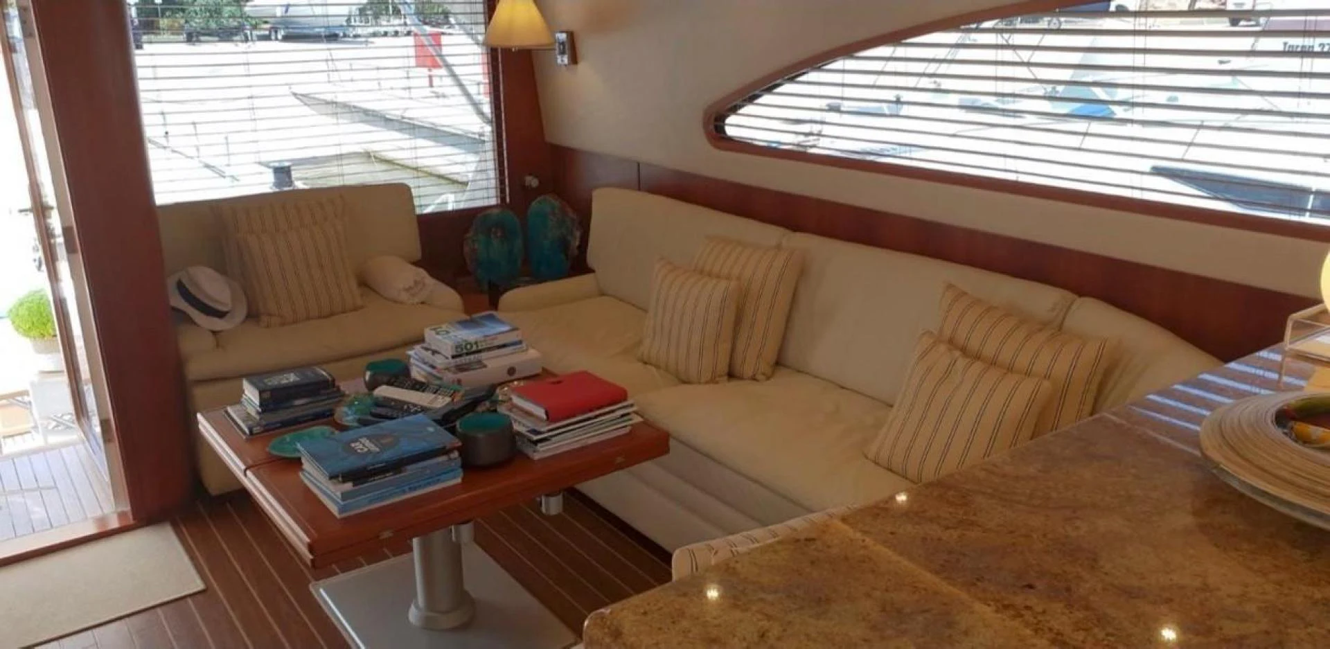 a living room with a couch and coffee table aboard BOUKI Yacht for Sale