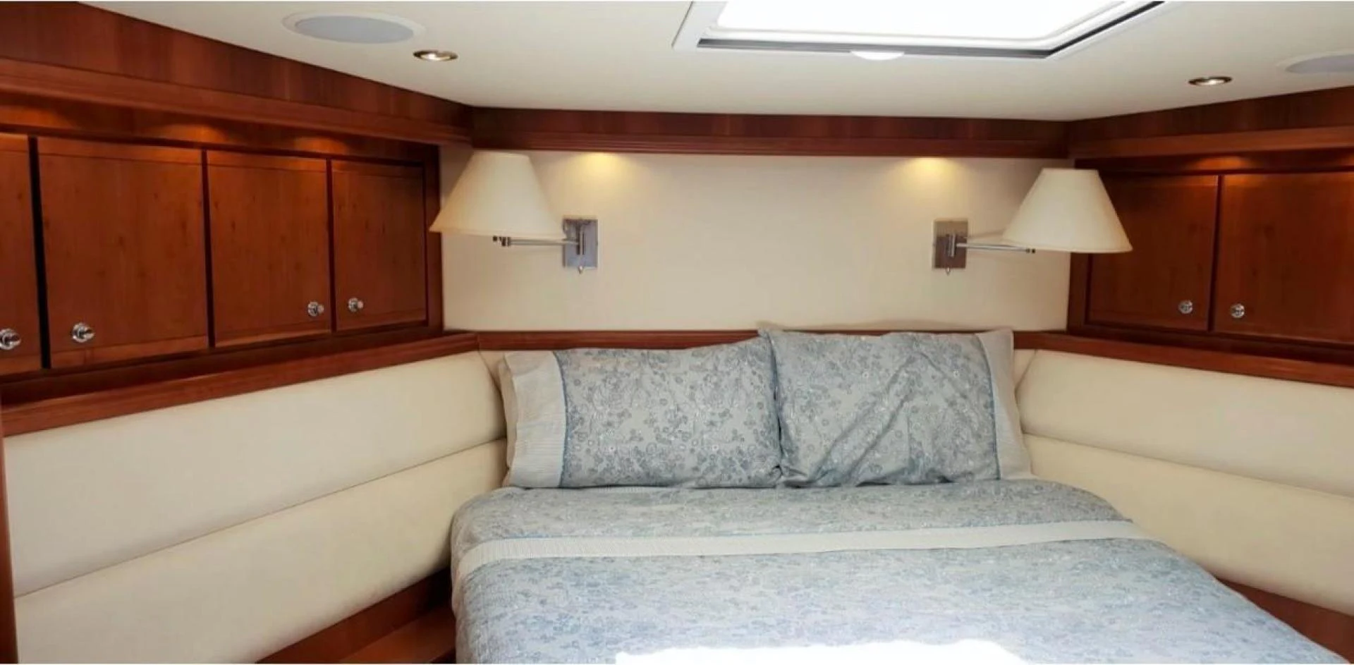 a bed with a white pillow aboard BOUKI Yacht for Sale