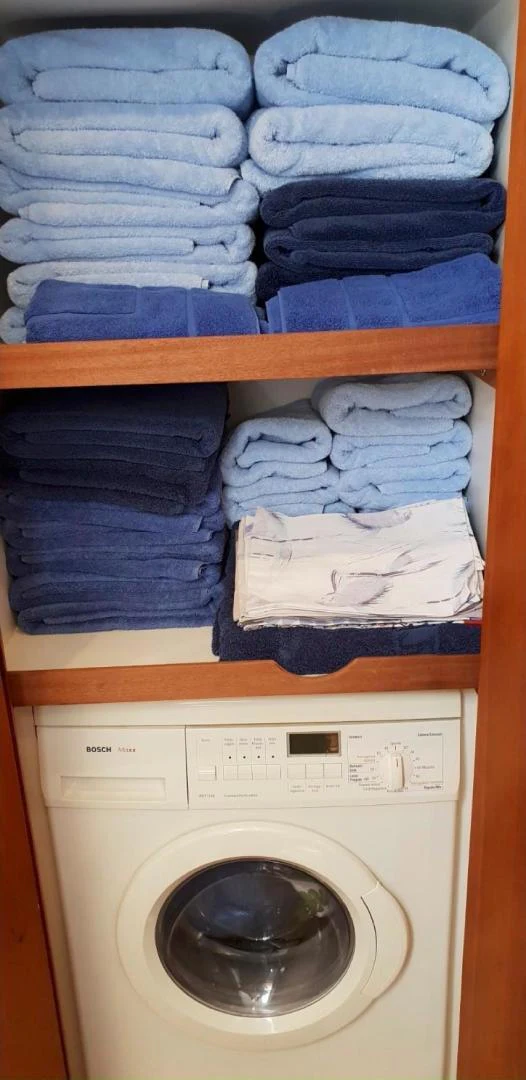 clothes on a shelf aboard BOUKI Yacht for Sale