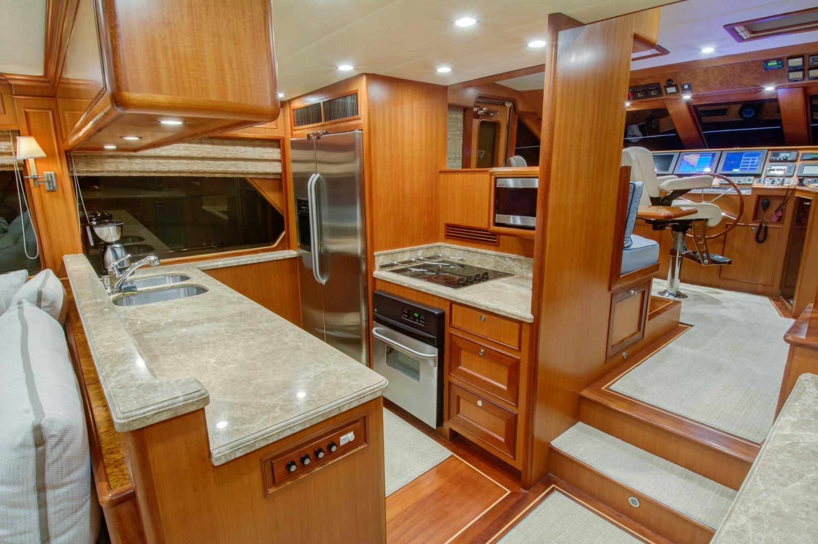 a kitchen with a large island aboard No Name Yacht for Sale