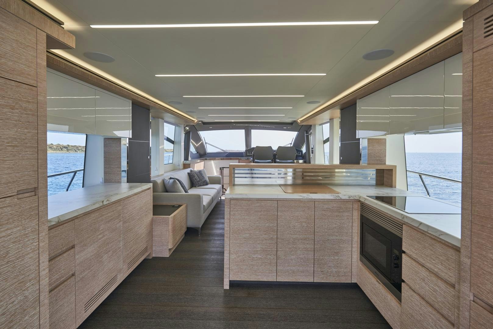 a room with a couch and a table aboard No Name Yacht for Sale