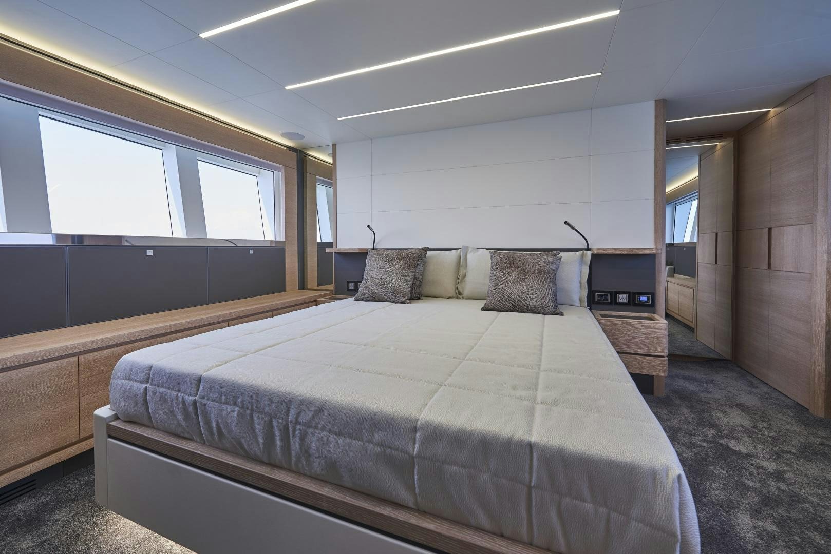 a bed in a room aboard No Name Yacht for Sale
