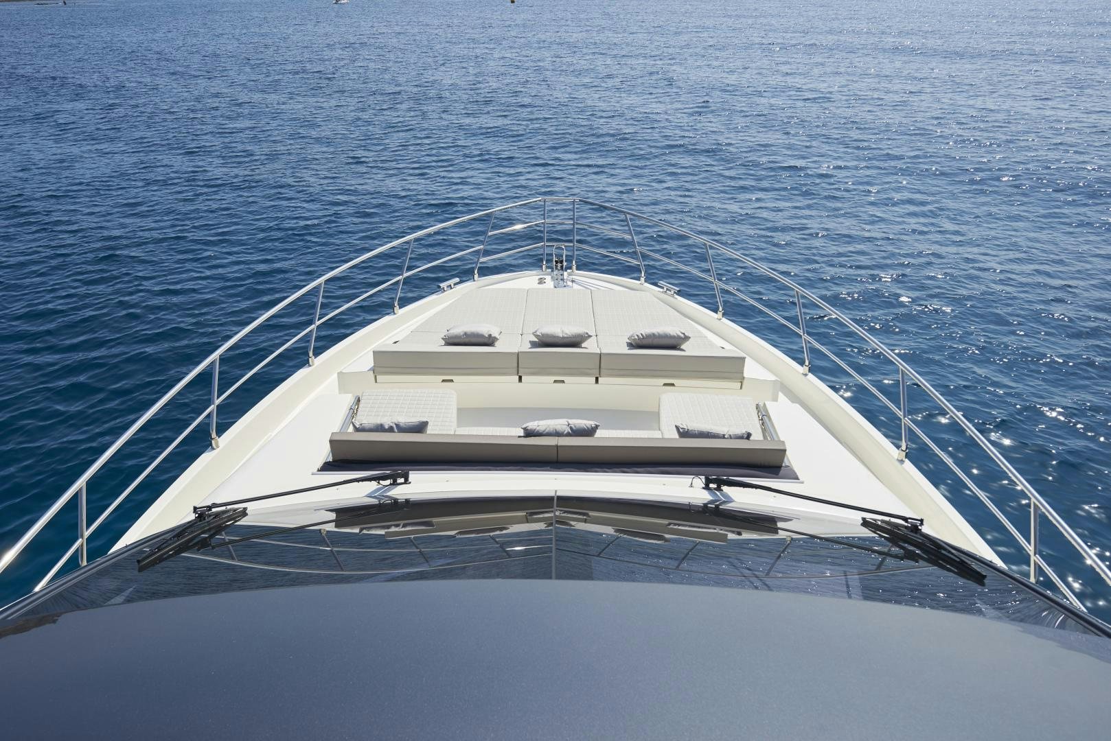 a white boat in the water aboard No Name Yacht for Sale