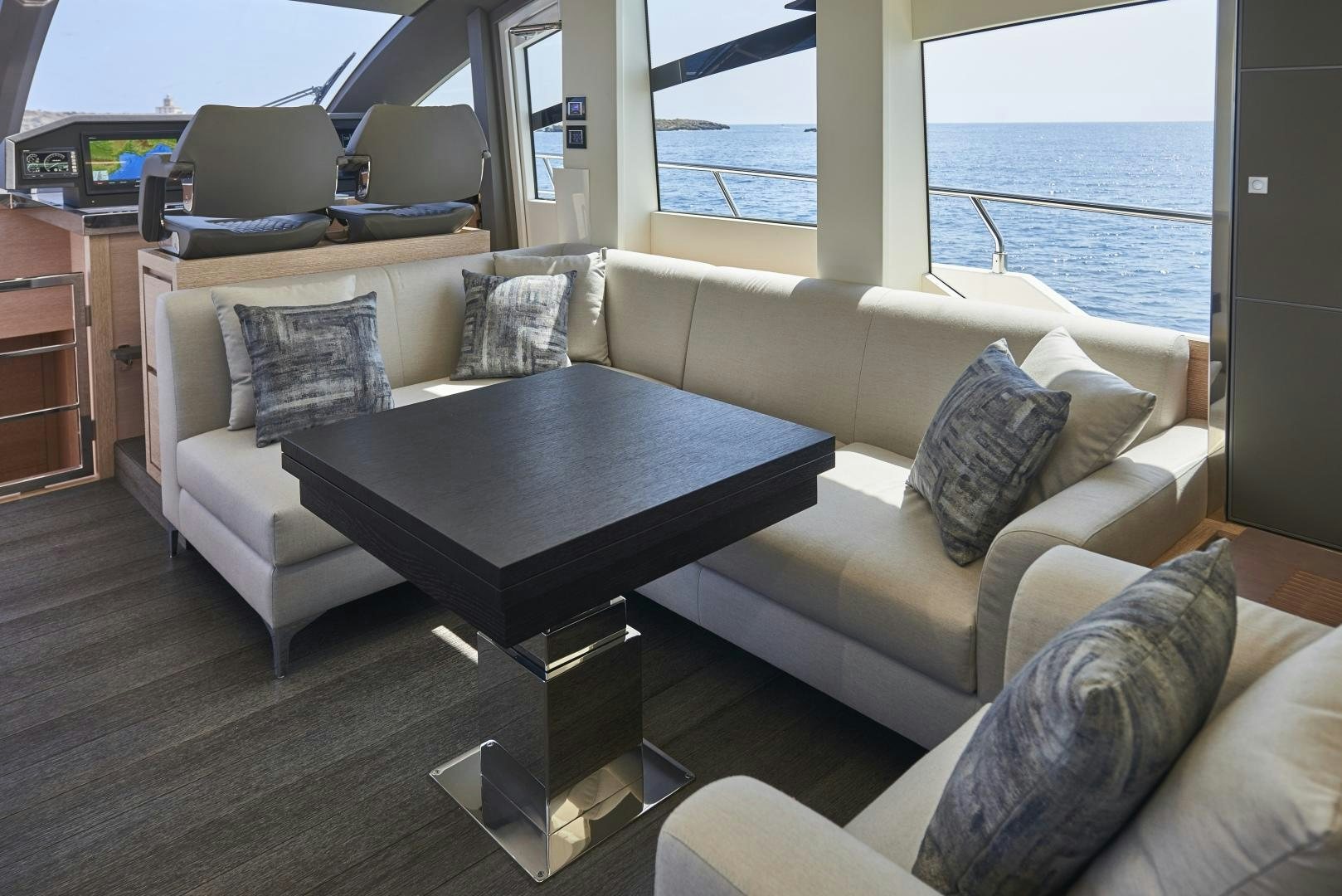 a living room with a large window aboard No Name Yacht for Sale