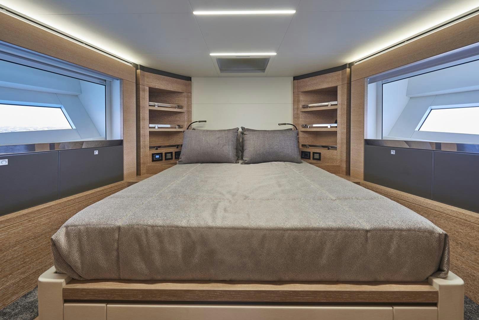 a bed in a room aboard No Name Yacht for Sale