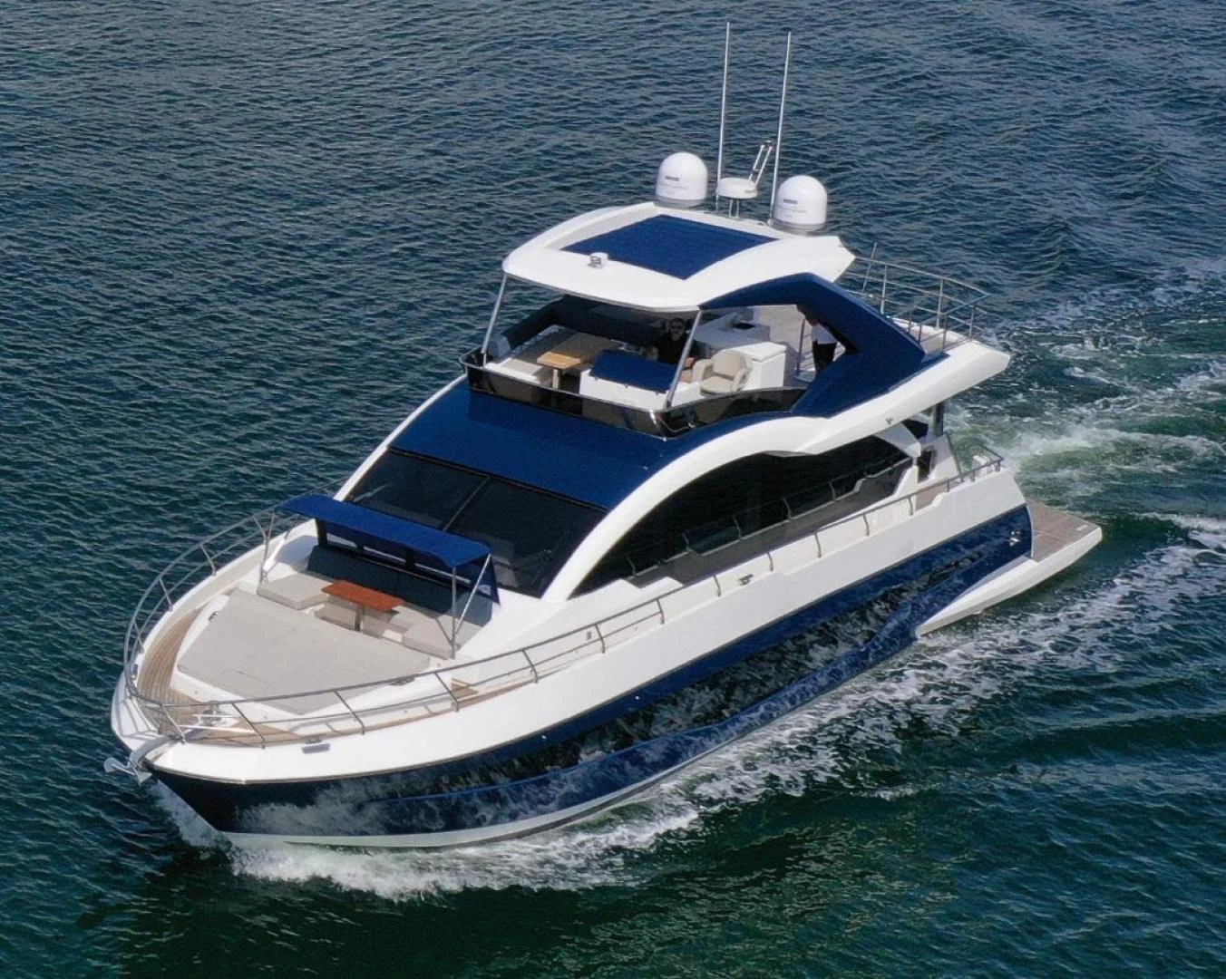a boat on the water aboard THE ONLY BLUE 66 FLY Yacht for Sale