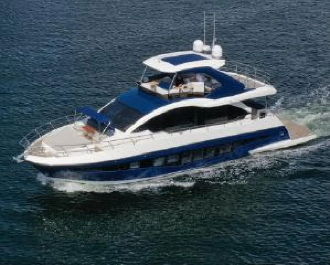 a boat on the water aboard THE ONLY BLUE 66 FLY Yacht for Sale