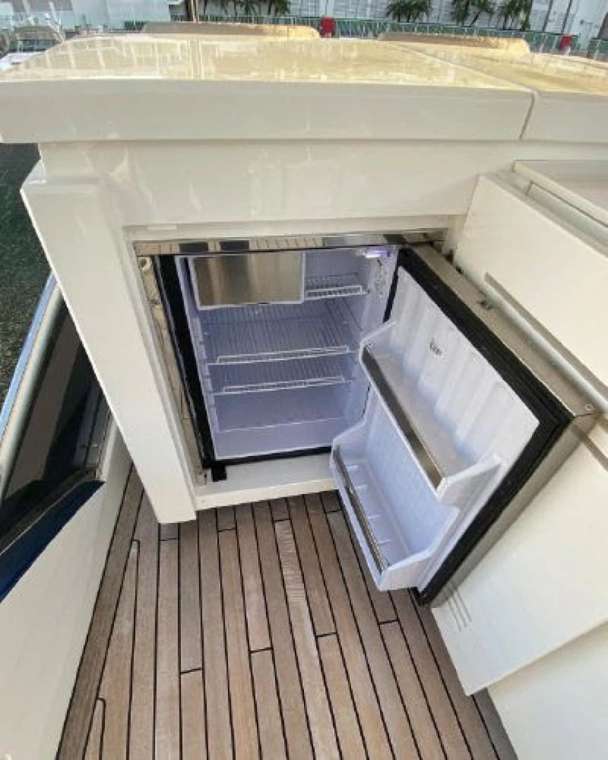 a kitchen with a large oven aboard THE ONLY BLUE 66 FLY Yacht for Sale