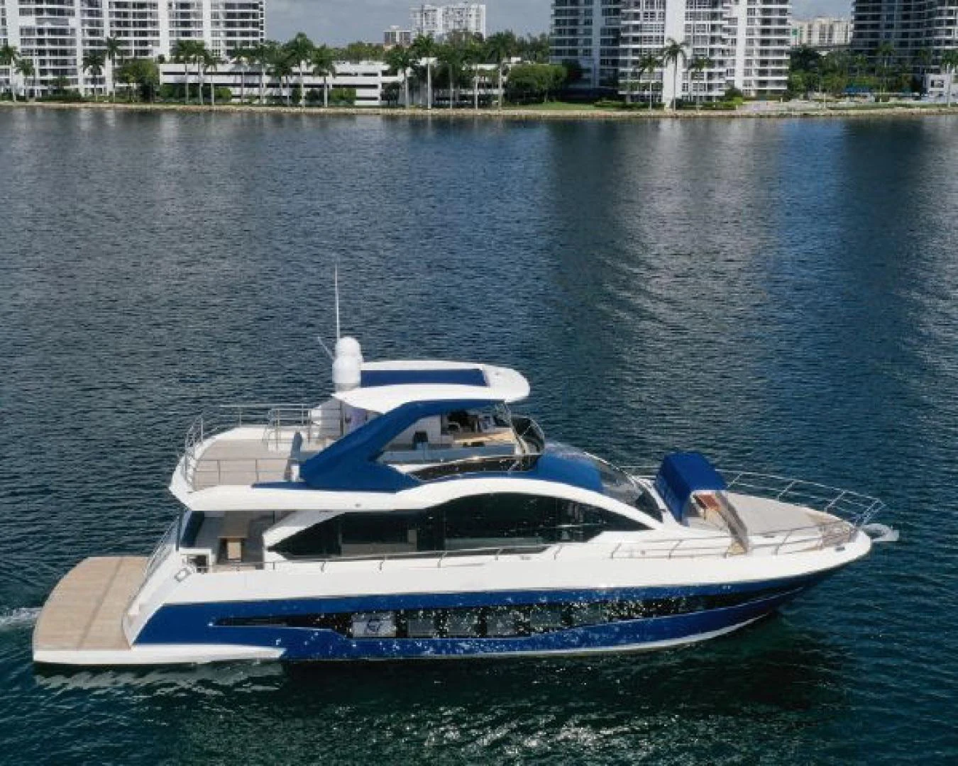 a boat on the water aboard THE ONLY BLUE 66 FLY Yacht for Sale