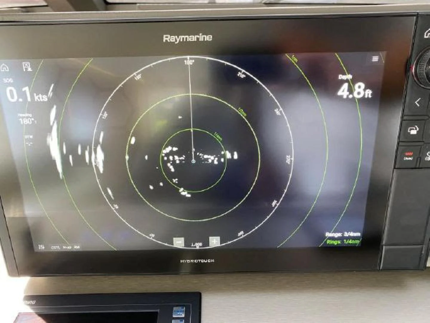 a computer screen with a blue circle aboard THE ONLY BLUE 66 FLY Yacht for Sale