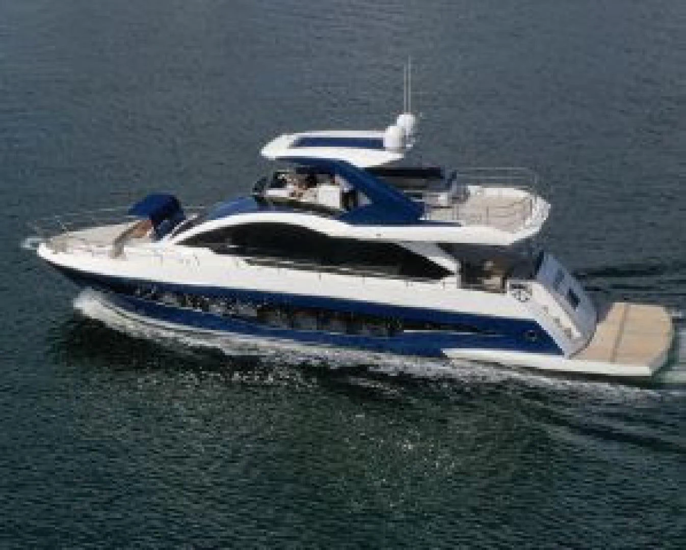 a boat in the water aboard THE ONLY BLUE 66 FLY Yacht for Sale