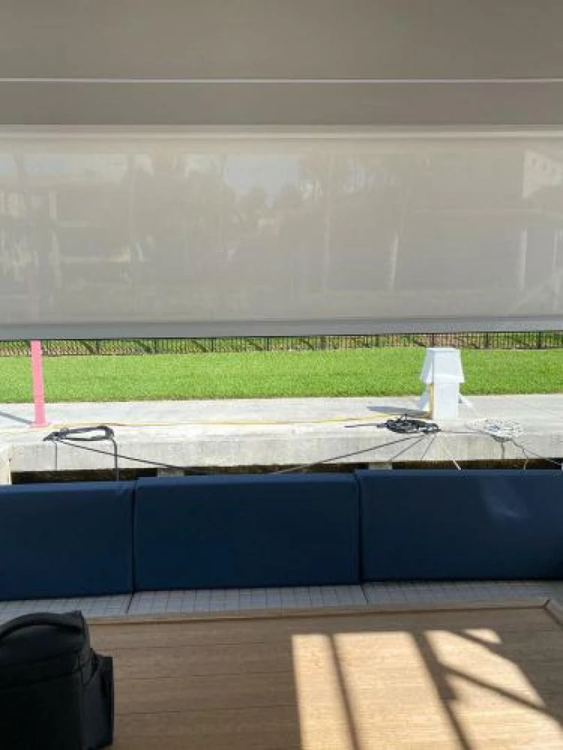 a view of a field from a window aboard THE ONLY BLUE 66 FLY Yacht for Sale