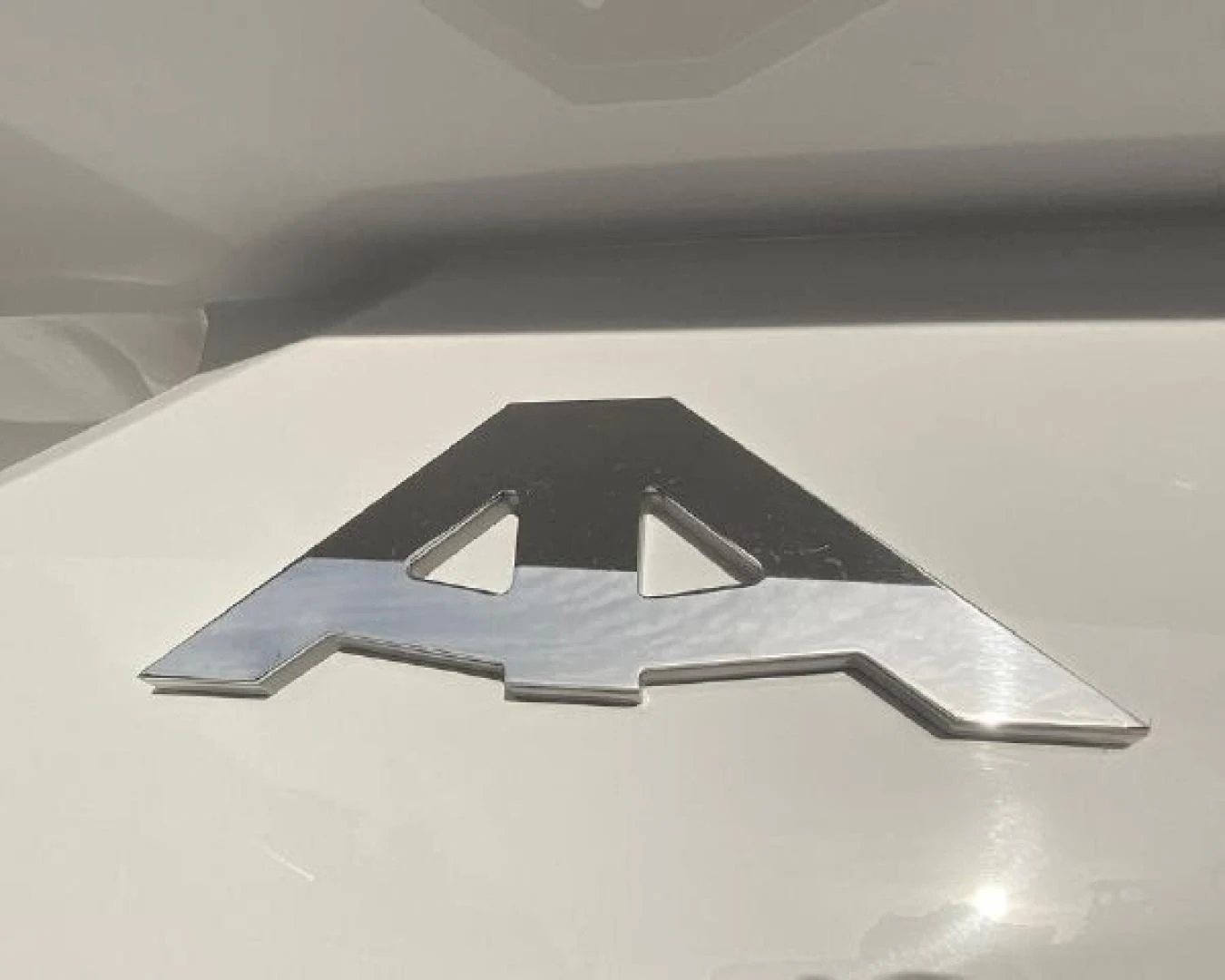 a white rectangular object with a black center aboard THE ONLY BLUE 66 FLY Yacht for Sale