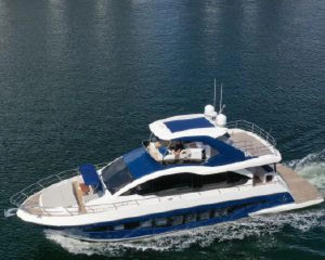 a boat on the water aboard THE ONLY BLUE 66 FLY Yacht for Sale
