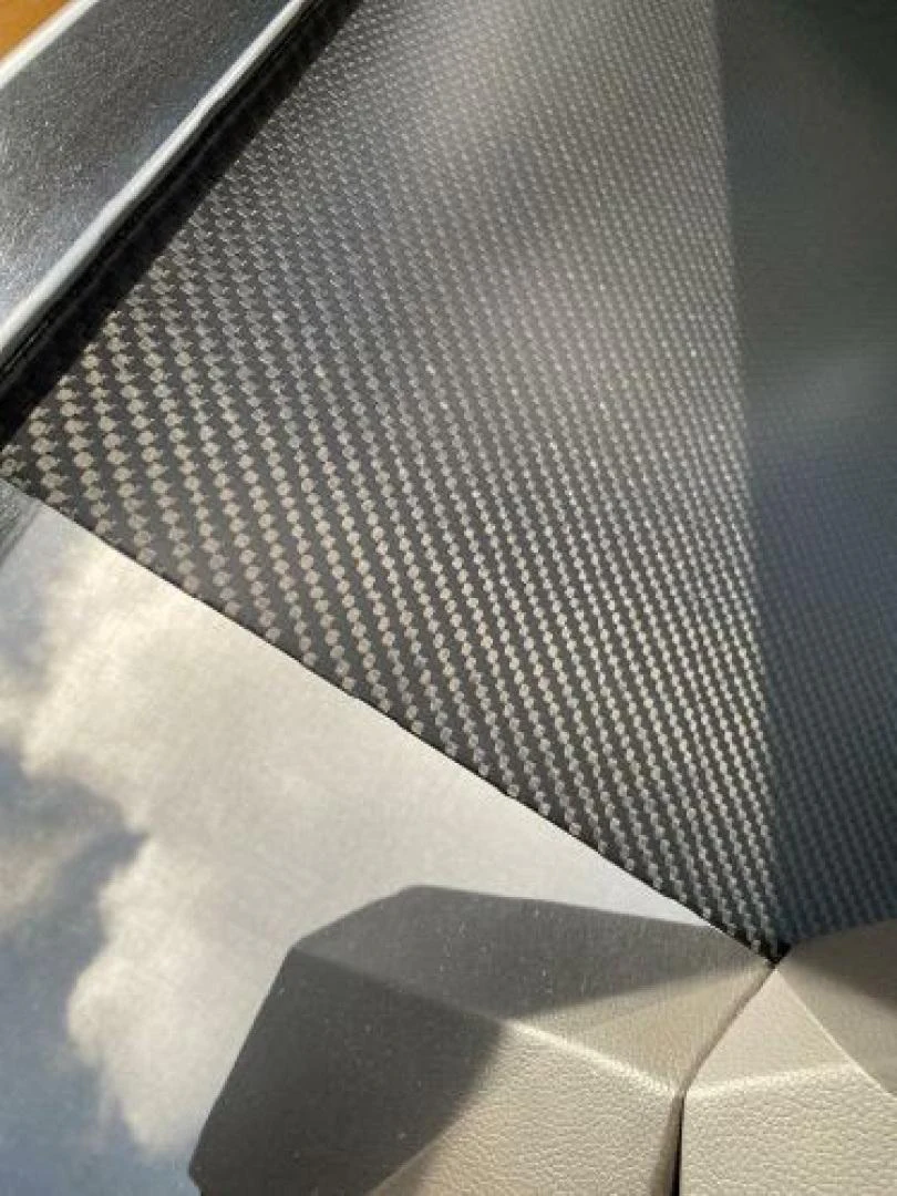 a close up of a black surface aboard THE ONLY BLUE 66 FLY Yacht for Sale