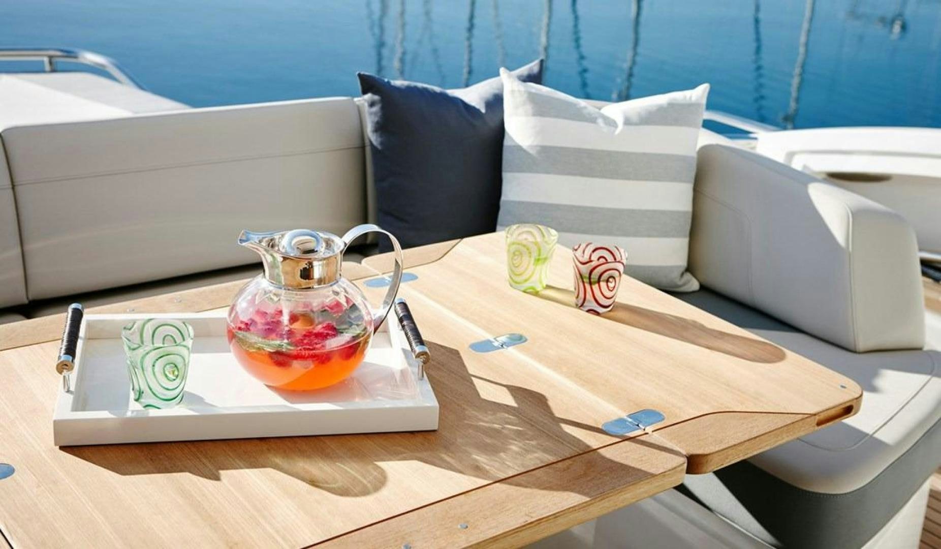 a glass jar on a table aboard Namaste Yacht for Sale
