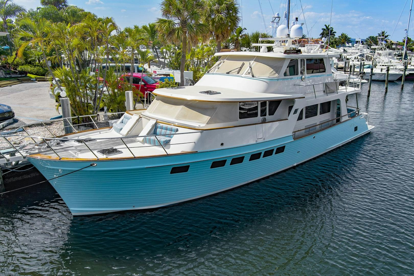 a boat docked at a pier aboard JOAN'S RONDEVOUS Yacht for Sale