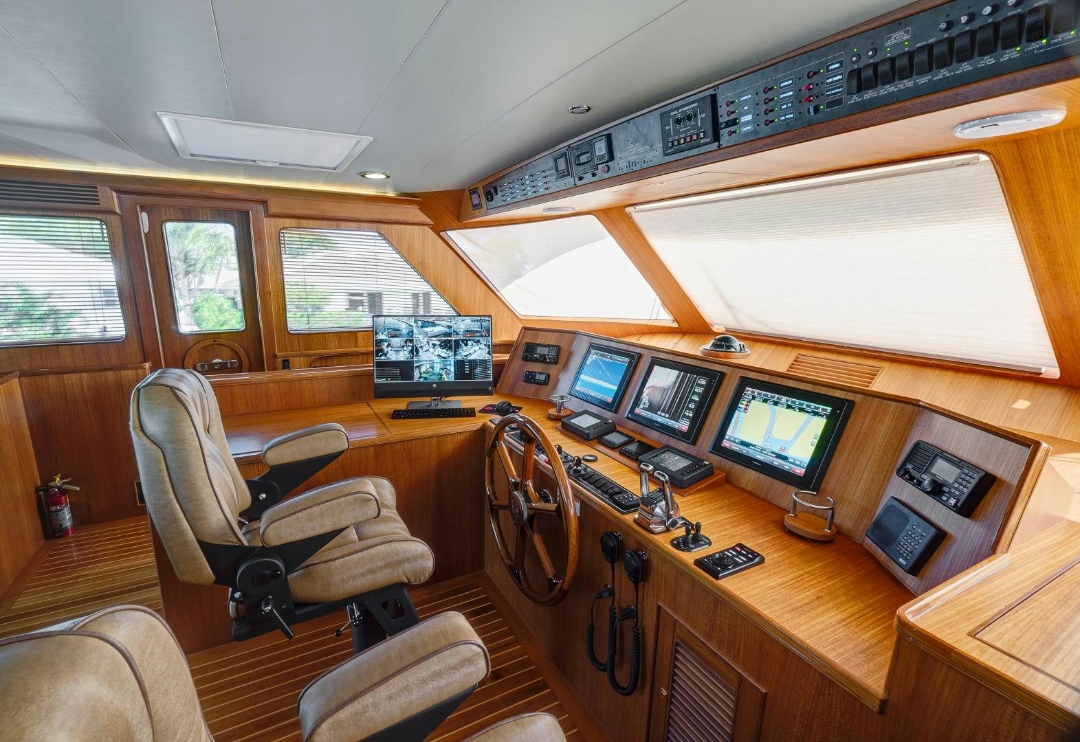 a room with computers and chairs aboard JOAN'S RONDEVOUS Yacht for Sale