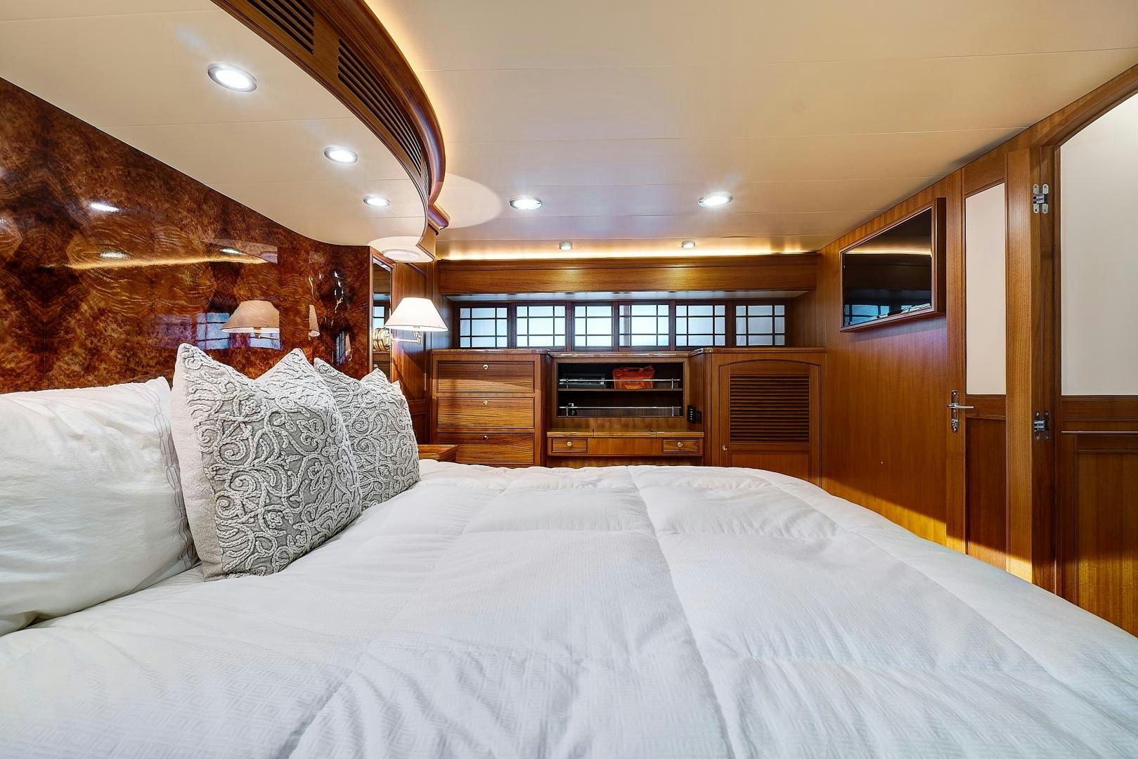 a large bed in a room aboard JOAN'S RONDEVOUS Yacht for Sale